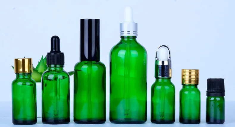 Green essential oil bottle 0