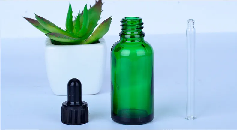 Green essential oil bottle 1