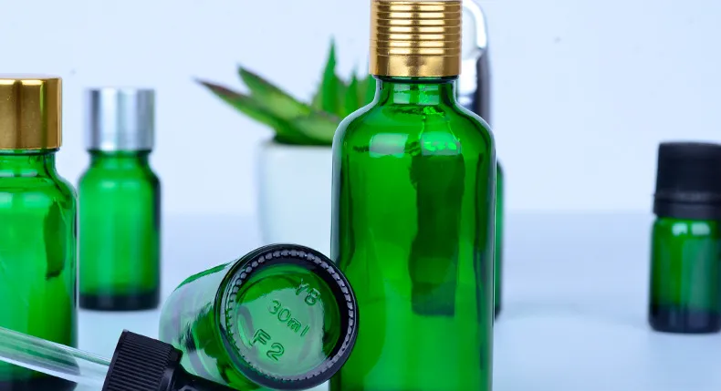 Green essential oil bottle 2